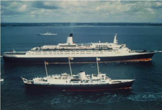 Her Majesty Queen Elizabeth The Queen Mother onboard the Royal Yacht Britannia welcomes QE2 home after her Falklands service in June 1982.