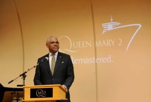 Arnold Donald, CEO, Carnival Corporation, the parent company of Cunard, speaks about the remastered Queen Mary 2, Wednesday, July 6, 2016, at Brooklyn Cruise Terminal in New York, its U.S. homeport.  The Queen Mary 2 spent 25 days in dry dock and a refit that cost in the region of $132 million, renovating its staterooms, restaurants and public areas.  (Diane Bondareff/AP Images for Cunard)