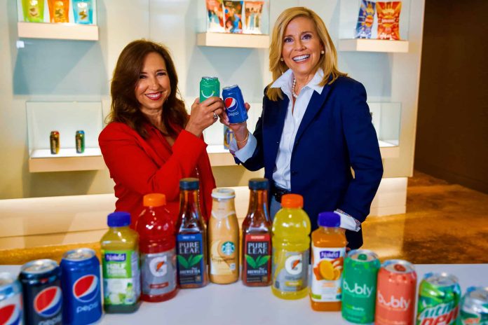 Christine Duffy (L), president of Carnival Cruise Line, and Anne Fink (R), president of PepsiCo