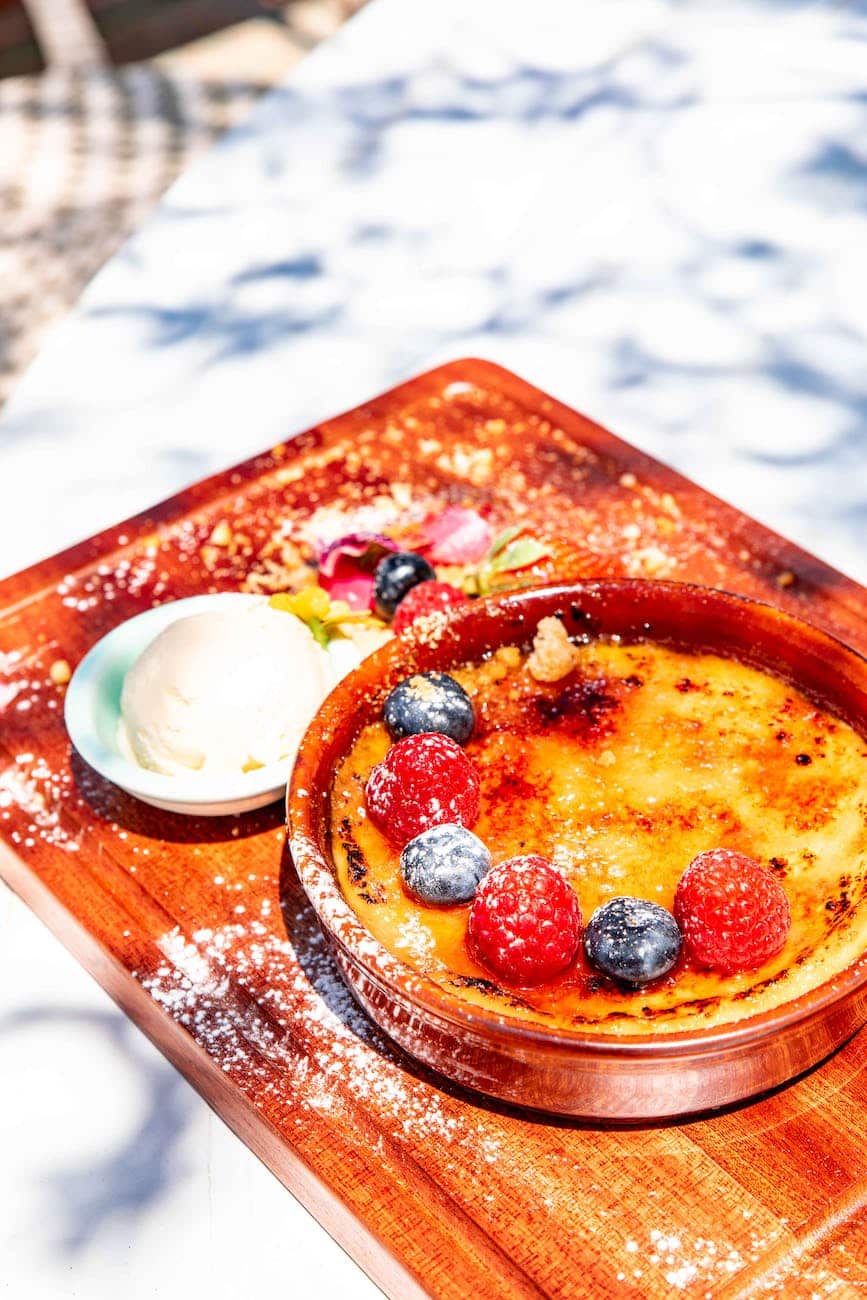 creme brulee with berries on top